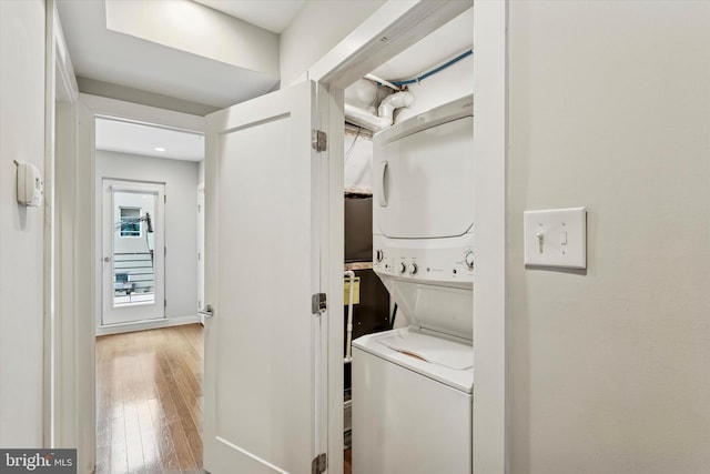 1524 N 2nd St Unit 2, Philadelphia, PA 19122 - laundry room with stacked washing machine and dryer, light wood-style flooring, and recessed lighting