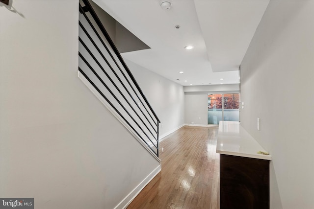 1524 N 2nd St Unit 2, Philadelphia, PA 19122 - stairway with baseboards, hardwood / wood-style flooring, and recessed lighting
