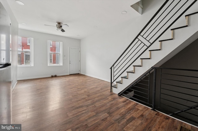 2214 N Cleveland St, Philadelphia, PA 19132 - unfurnished living room with wood finished floors, stairs, ceiling fan, baseboards, and recessed lighting