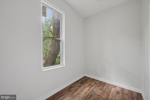 2214 N Cleveland St, Philadelphia, PA 19132 - unfurnished room with baseboards and dark wood-style flooring