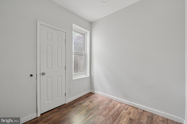 2214 N Cleveland St, Philadelphia, PA 19132 - unfurnished bedroom featuring baseboards and wood finished floors