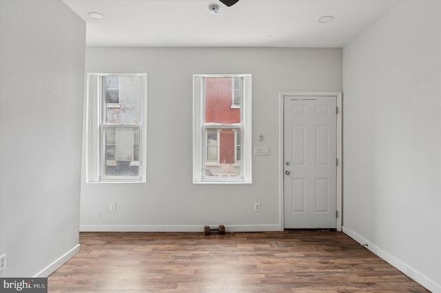 2214 N Cleveland St, Philadelphia, PA 19132 - spare room with wood finished floors, baseboards, and a ceiling fan