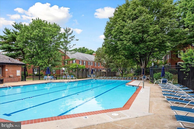 community pool with fence