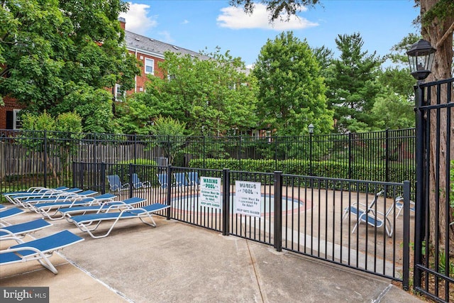 view of patio / terrace featuring fence