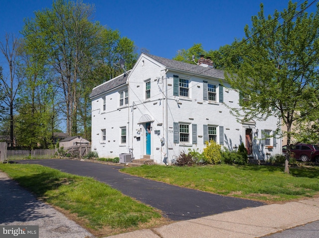 718 Moore Ave, Bryn Mawr, PA 19010 - multi unit property featuring a chimney, central air condition unit, and entry steps