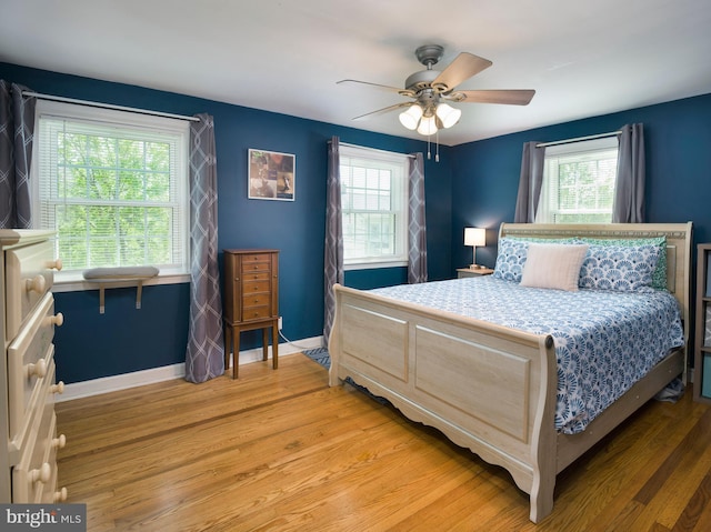 718 Moore Ave, Bryn Mawr, PA 19010 - bedroom featuring light wood finished floors, ceiling fan, and baseboards