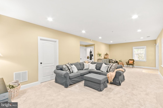 4108 Brushfield Dr, Frederick, MD 21704 - living room featuring light carpet, baseboards, and recessed lighting