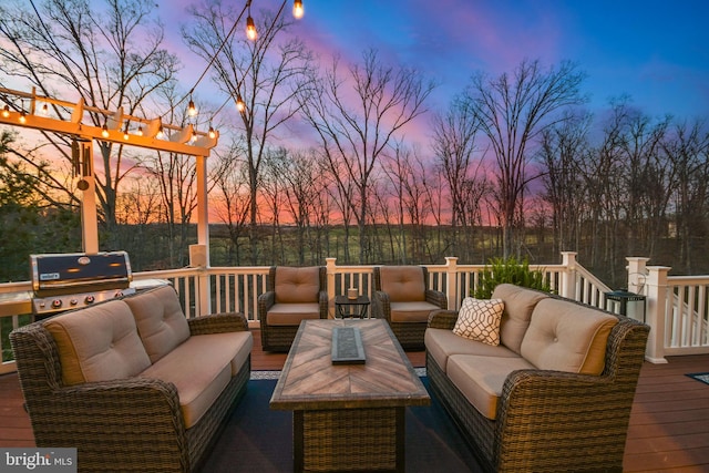 4108 Brushfield Dr, Frederick, MD 21704 - deck at dusk with an outdoor hangout area and grilling area
