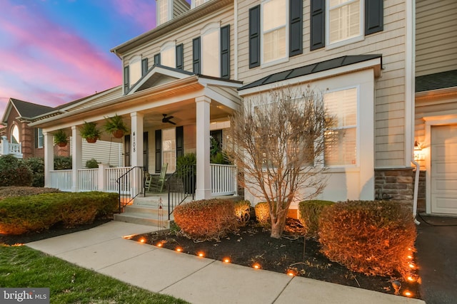 4108 Brushfield Dr, Frederick, MD 21704 - property entrance with covered porch and stone siding