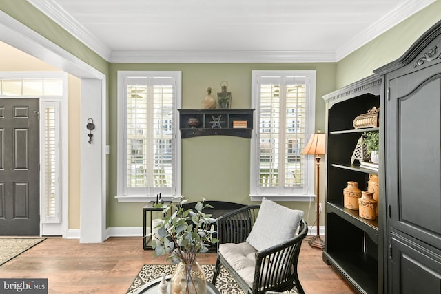 4108 Brushfield Dr, Frederick, MD 21704 - entrance foyer with healthy amount of natural light, crown molding, wood finished floors, and baseboards