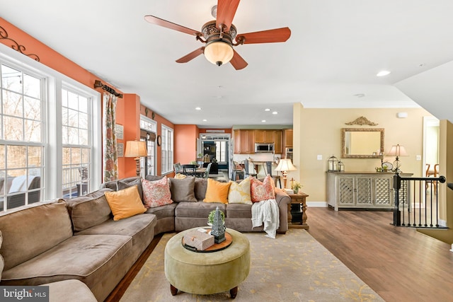 4108 Brushfield Dr, Frederick, MD 21704 - living area featuring wood finished floors, recessed lighting, ceiling fan, and baseboards