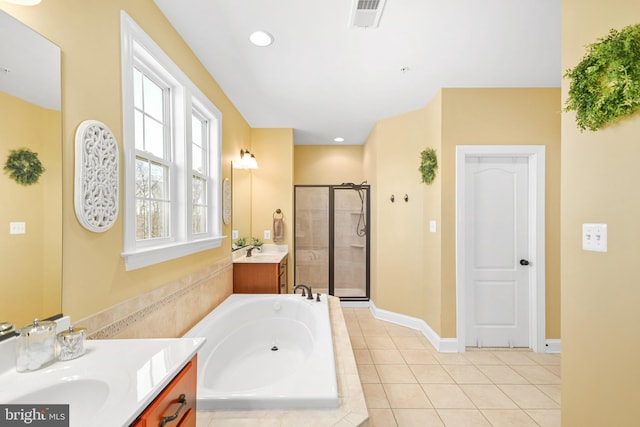 4108 Brushfield Dr, Frederick, MD 21704 - bathroom featuring a shower stall, a garden tub, tile patterned flooring, vanity, and recessed lighting