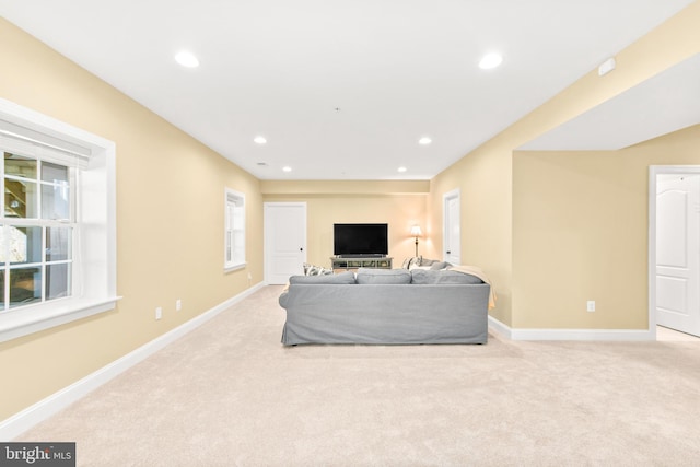 4108 Brushfield Dr, Frederick, MD 21704 - living room with light carpet, baseboards, and recessed lighting