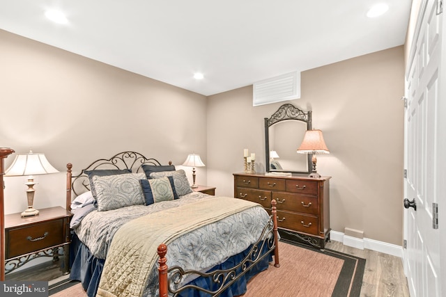 4108 Brushfield Dr, Frederick, MD 21704 - bedroom featuring baseboards, wood finished floors, a closet, and recessed lighting