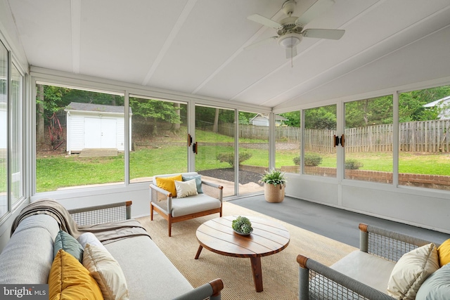 sunroom featuring plenty of natural light, an outdoor hangout area, and ceiling fan