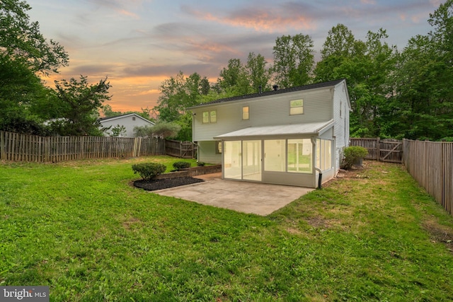 rear view of house featuring a patio area