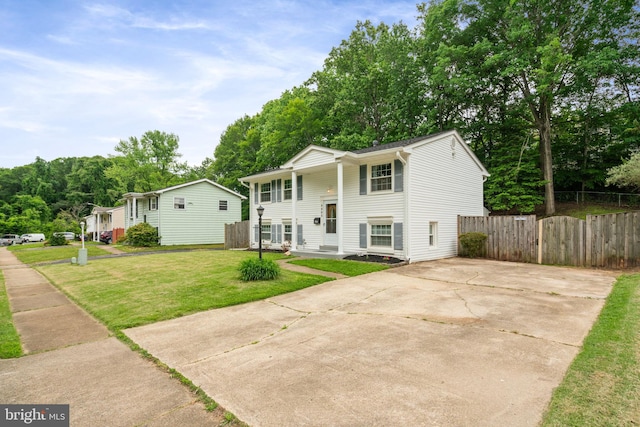 raised ranch featuring driveway