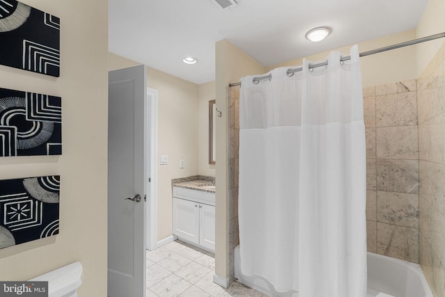 1811 Chestnut St Unit 405, Philadelphia, PA 19103 - bathroom with vanity, shower / bath combo, tile patterned floors, toilet, and recessed lighting