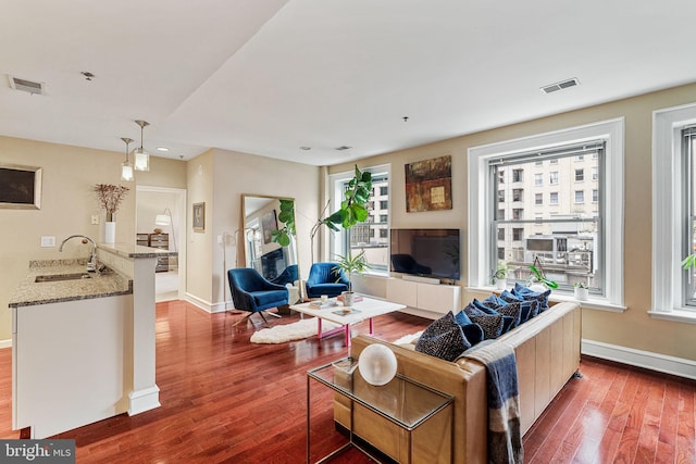 1811 Chestnut St Unit 405, Philadelphia, PA 19103 - living room featuring wood-type flooring, baseboards, and recessed lighting