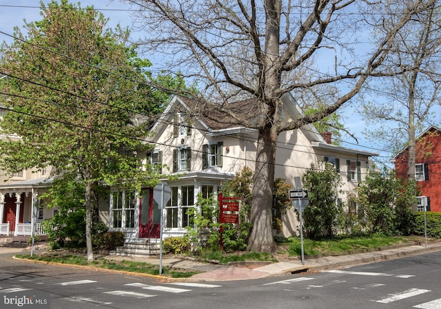 view of front of house featuring stucco siding