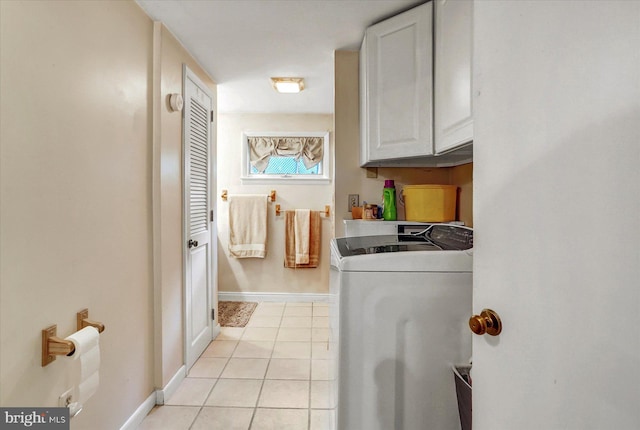 5538 Turkey Rd, Fort Loudon, PA 17224 - laundry area featuring cabinet space, washer and clothes dryer, light tile patterned flooring, and baseboards