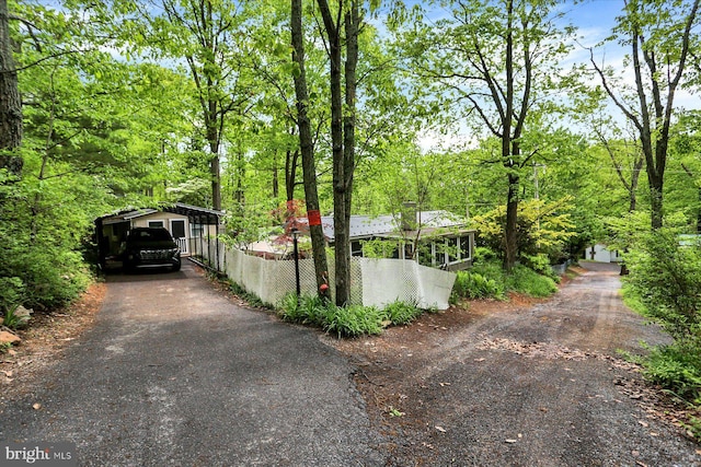 5538 Turkey Rd, Fort Loudon, PA 17224 - view of side of home featuring driveway, fence, and a detached carport