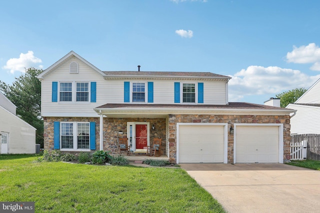 view of front of home with concrete driveway, stone siding, and a porch