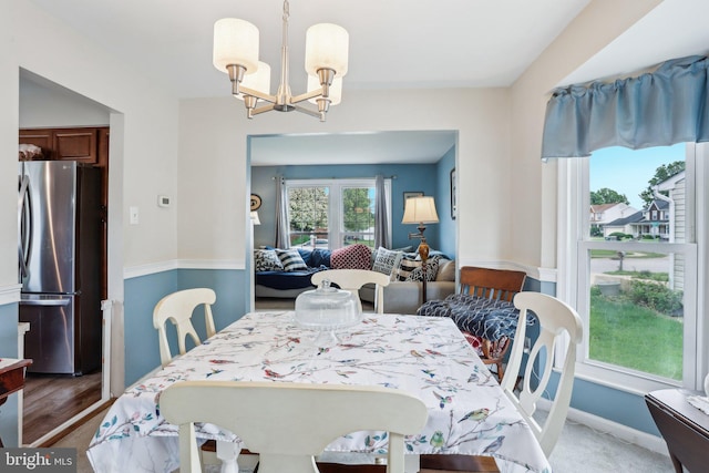 dining room with a chandelier