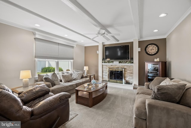 carpeted living room featuring recessed lighting, ceiling fan, ornamental molding, beam ceiling, and a fireplace