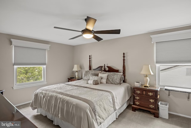 bedroom featuring carpet floors, baseboards, and ceiling fan