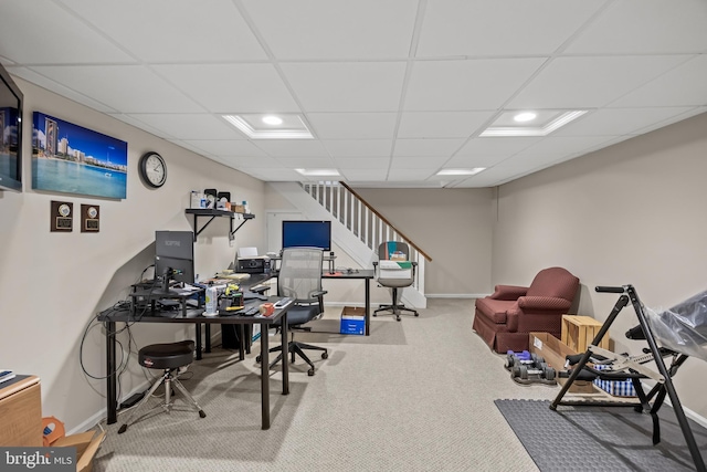 home office featuring carpet flooring, a paneled ceiling, and baseboards