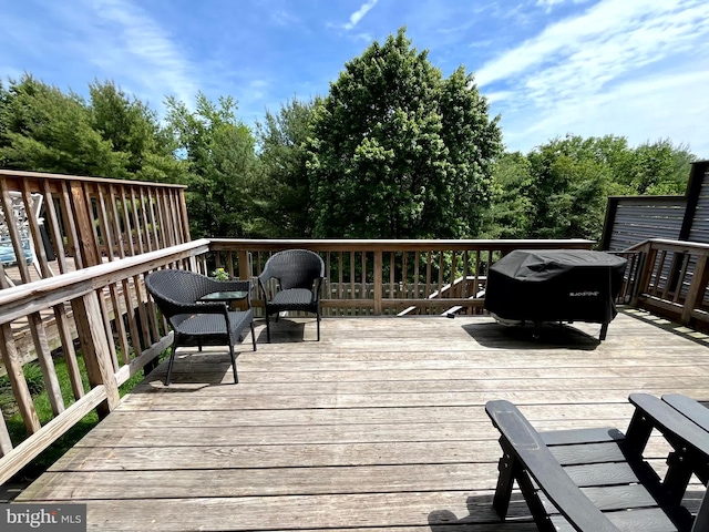 deck featuring area for grilling