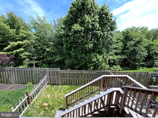 wooden terrace featuring stairs