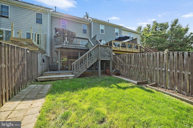146 Connery Ter SW, Leesburg, VA 20175 - back of house with a deck and stairway