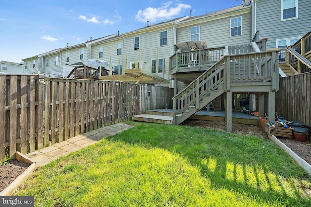 146 Connery Ter SW, Leesburg, VA 20175 - back of house featuring a wooden deck, a residential view, and stairs