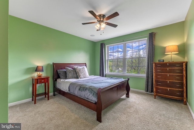 bedroom featuring baseboards, carpet, and ceiling fan