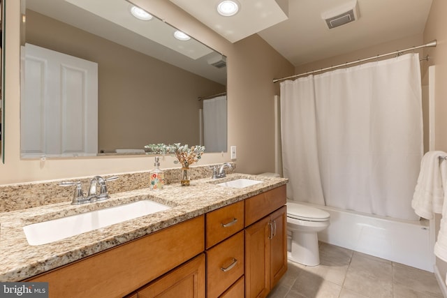 bathroom with toilet, double vanity, tile patterned floors, shower / bath combo with shower curtain, and recessed lighting