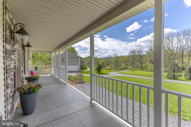 view of patio featuring a porch