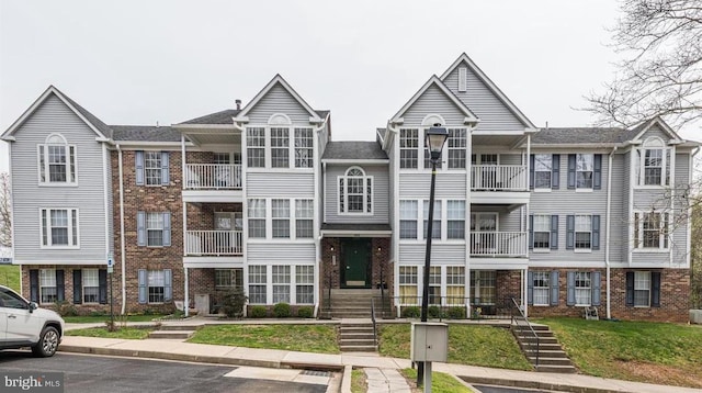 multi unit property featuring brick siding