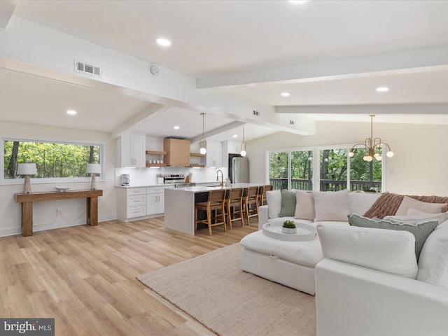 139 Laura Ct, Basye, VA 22810 - living area with light wood-type flooring, recessed lighting, and a chandelier
