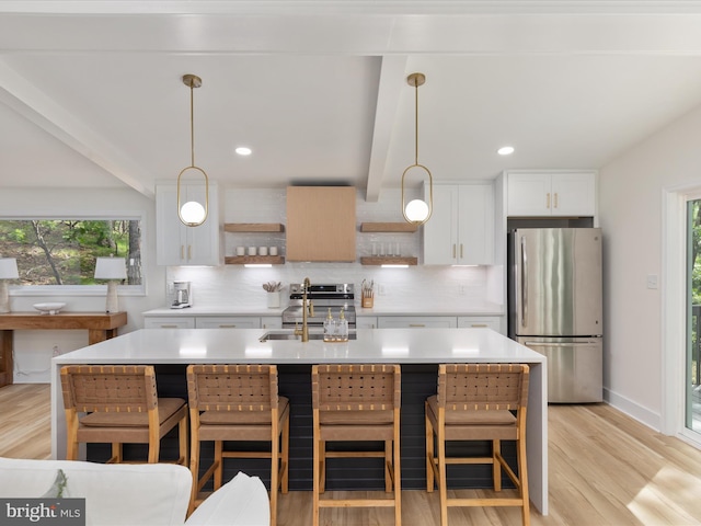 139 Laura Ct, Basye, VA 22810 - kitchen featuring freestanding refrigerator, a sink, tasteful backsplash, plenty of natural light, and beam ceiling
