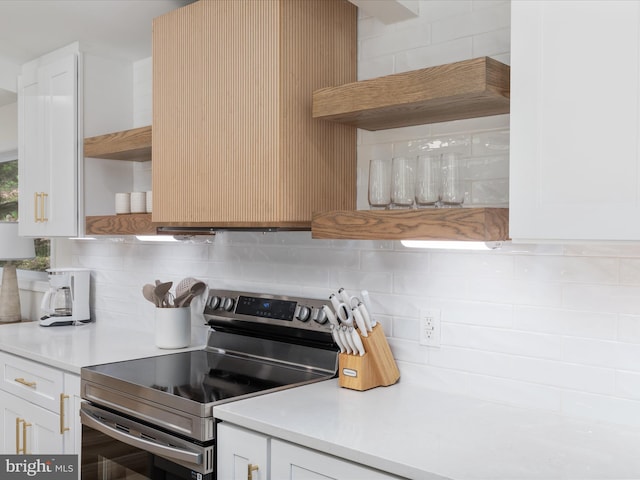 139 Laura Ct, Basye, VA 22810 - kitchen featuring stainless steel electric range, open shelves, tasteful backsplash, and white cabinetry