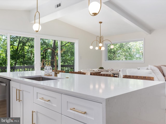 139 Laura Ct, Basye, VA 22810 - kitchen featuring stainless steel dishwasher, a sink, healthy amount of natural light, and white cabinetry