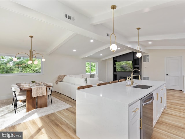 139 Laura Ct, Basye, VA 22810 - kitchen featuring a sink, light wood finished floors, white cabinetry, hanging light fixtures, and recessed lighting