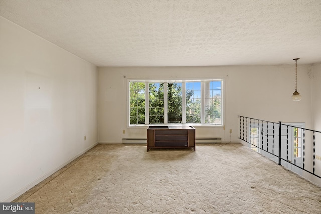 320 Dawn Ave, Woodstock, VA 22664 - unfurnished room with baseboard heating, a textured ceiling, light colored carpet, a baseboard radiator, and baseboards
