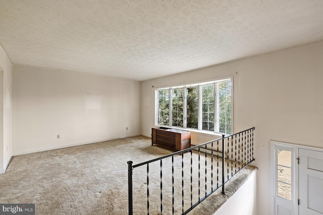 320 Dawn Ave, Woodstock, VA 22664 - stairs featuring a textured ceiling, carpet, a baseboard radiator, and baseboards