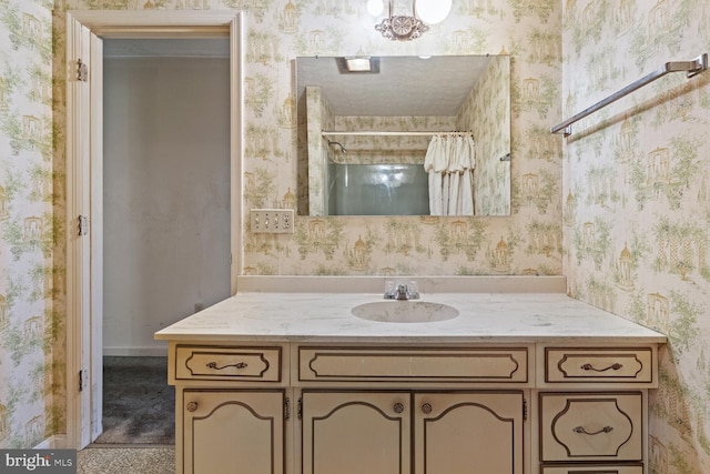 320 Dawn Ave, Woodstock, VA 22664 - bathroom with wallpapered walls, vanity, baseboards, and curtained shower
