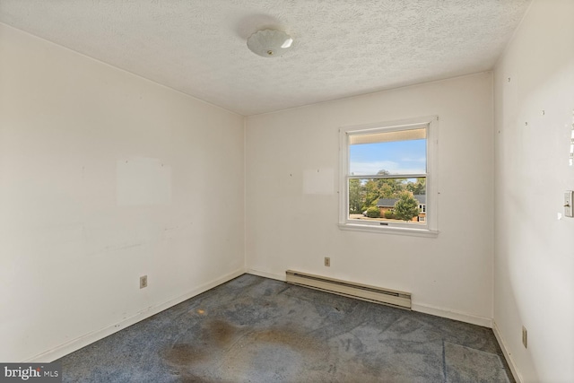 320 Dawn Ave, Woodstock, VA 22664 - carpeted empty room with a baseboard radiator, a textured ceiling, and baseboards