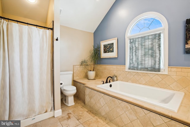 bathroom with vaulted ceiling, toilet, a garden tub, a shower with shower curtain, and tile patterned floors