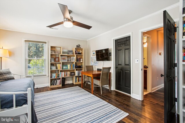 bedroom with crown molding, baseboards, dark wood-type flooring, and a ceiling fan